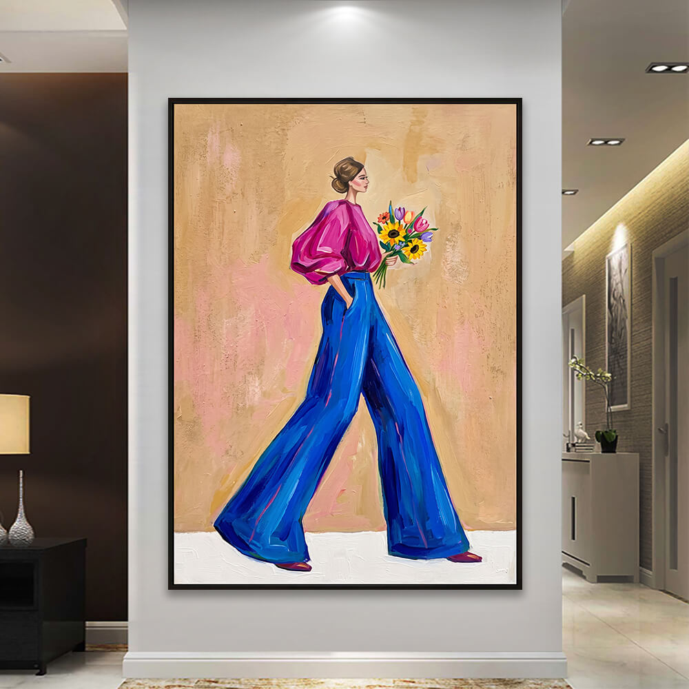 Interior styling view of Vibrant Stride wall art hanging above a table set with books and a vase.