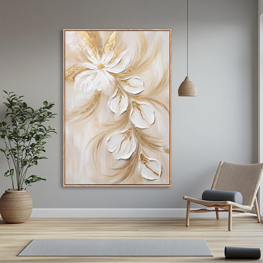 Light wood interior space, vertical neutral floral wall decor, thick texture trailing white flowers embellished with gold leaf