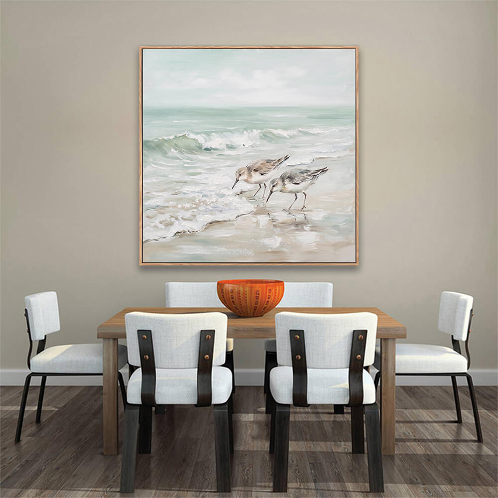 Calm sandpiper beach seascape hand-painted canvas decor above wooden dining table