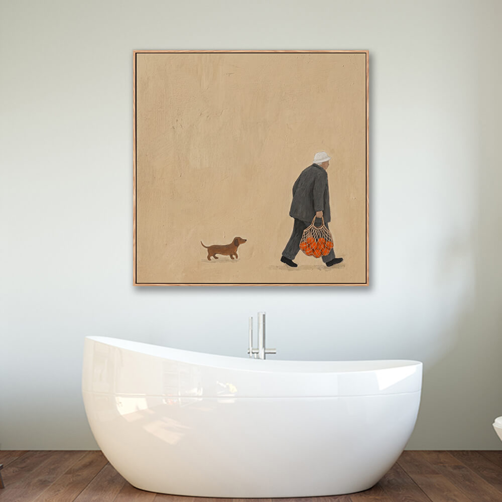 Framed minimalist old man with dachshund painting above bathtub in modern bathroom