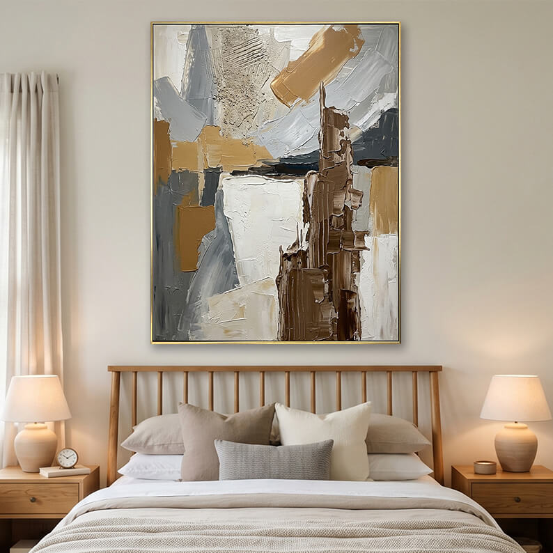 Grey beige and brown 3D textured abstract painting hanging over a wooden bed frame with neutral bedding.