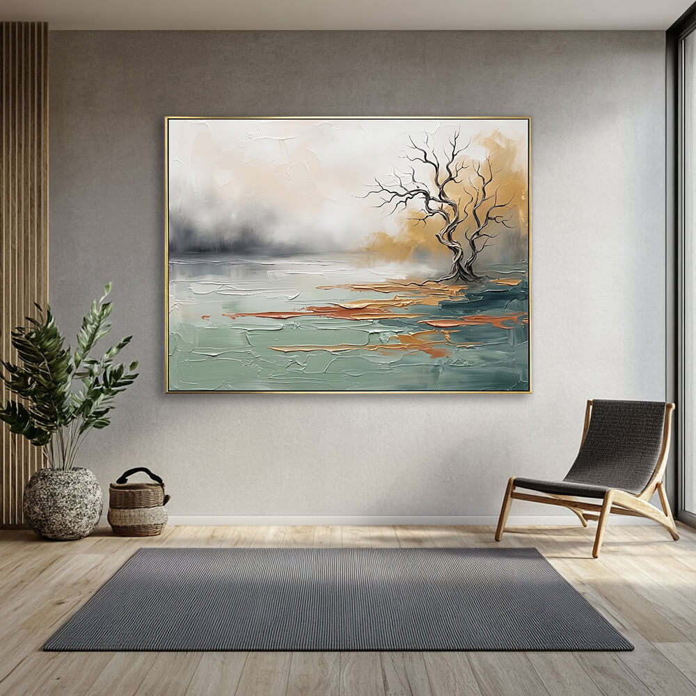 Sage green hand-painted landscape canvas wall art in a modern grey living room with a woven chair and potted plant