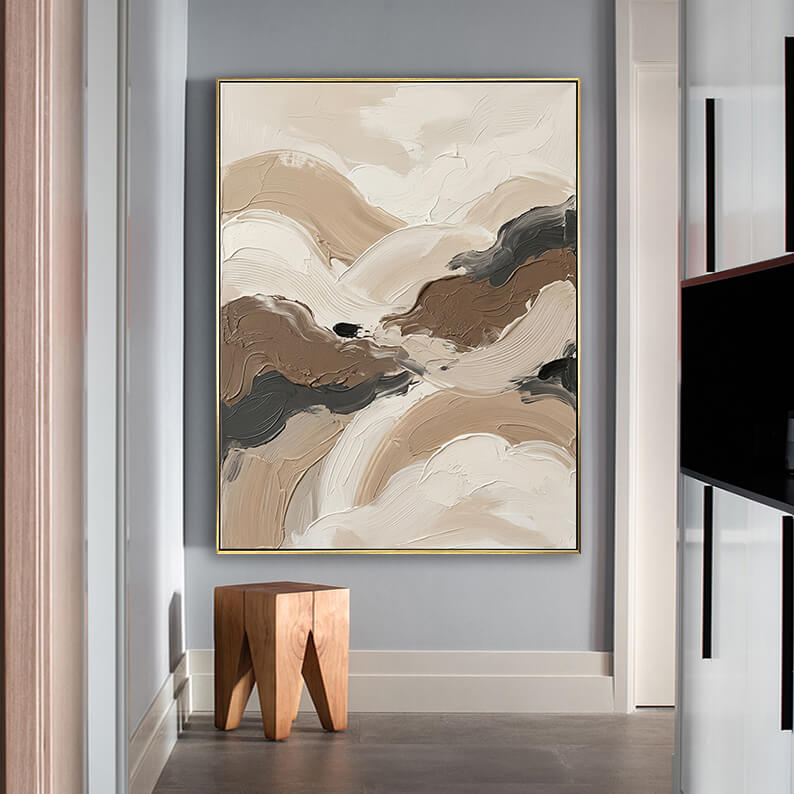 Abstract flowing 3D texture painting hanging above a geometric wooden stool in a minimalist modern hallway.