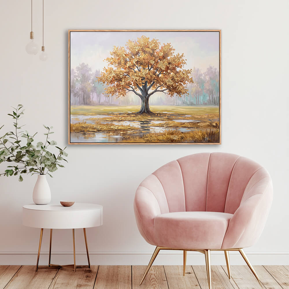 Textured golden Tree of Life artwork displayed in elegant room with pink velvet chair