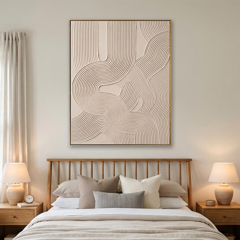 Beige heavy texture geometric line painting hanging over a wooden bed in a bright modern bedroom.