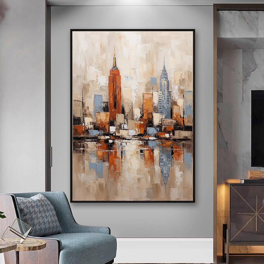 Ambient room styling featuring Urban Horizon original impasto city decor wall art hanging on a neutral wall next to a grey armchair.