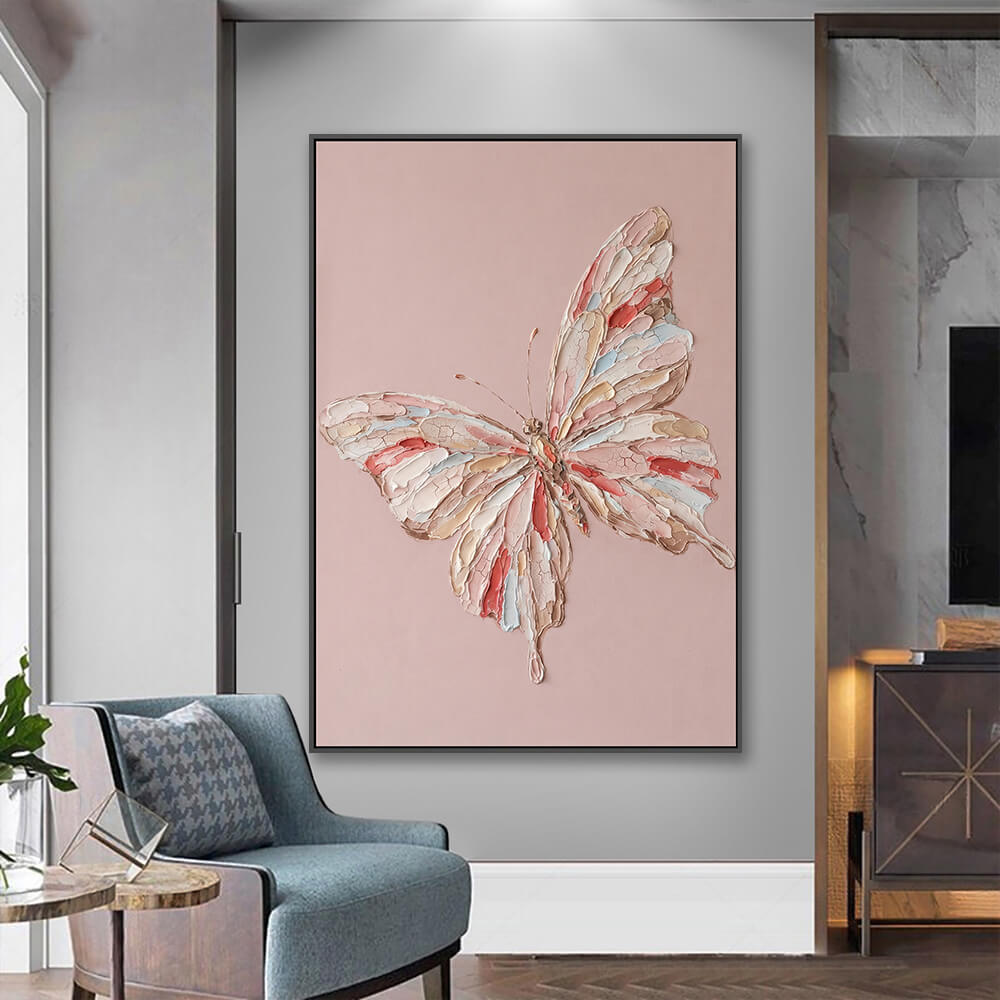 Vertical butterfly artwork hung in entryway beside upholstered accent chair