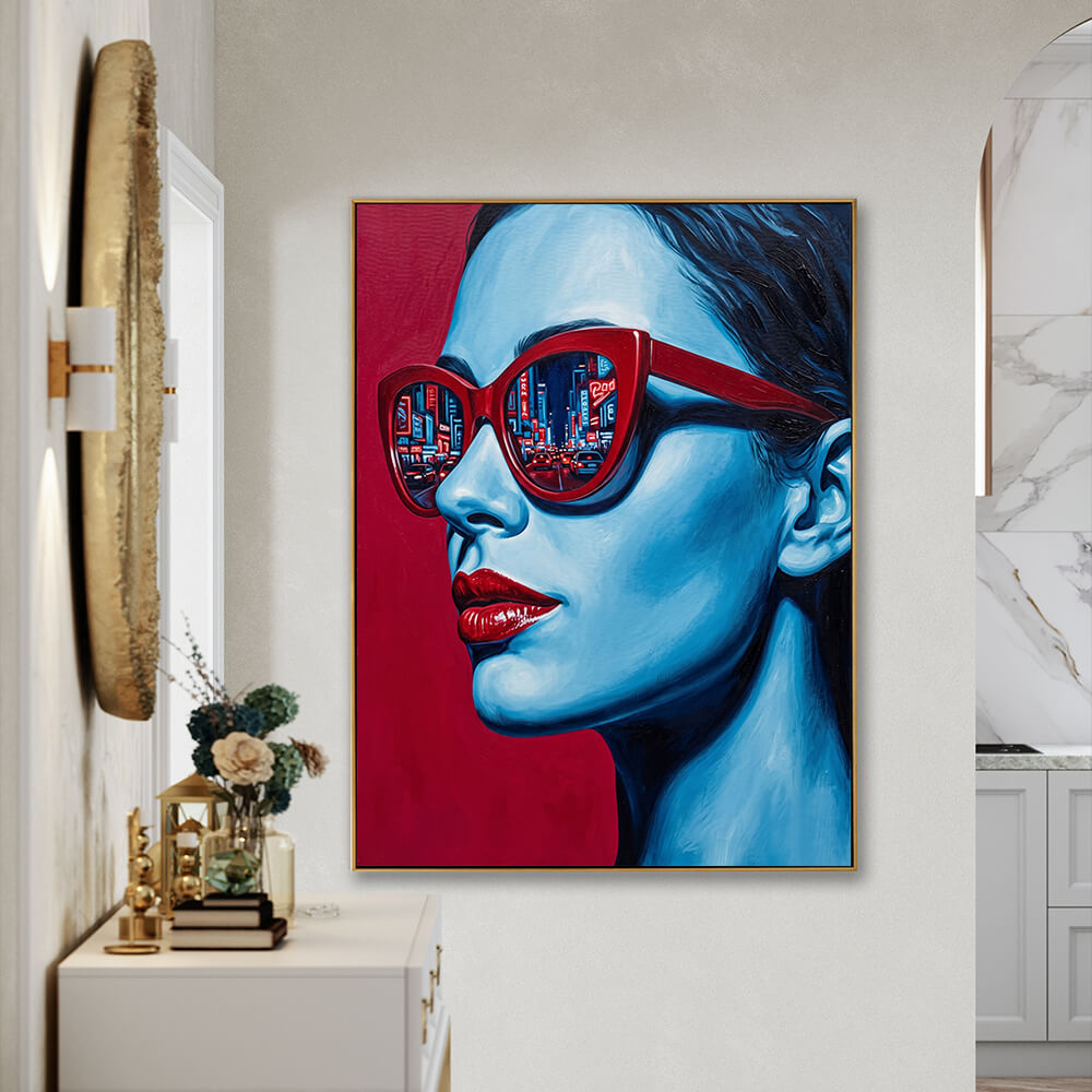Vibrant modern pop art woman portrait canvas wall art hung in minimalist light entryway with white console table and dried flower vase