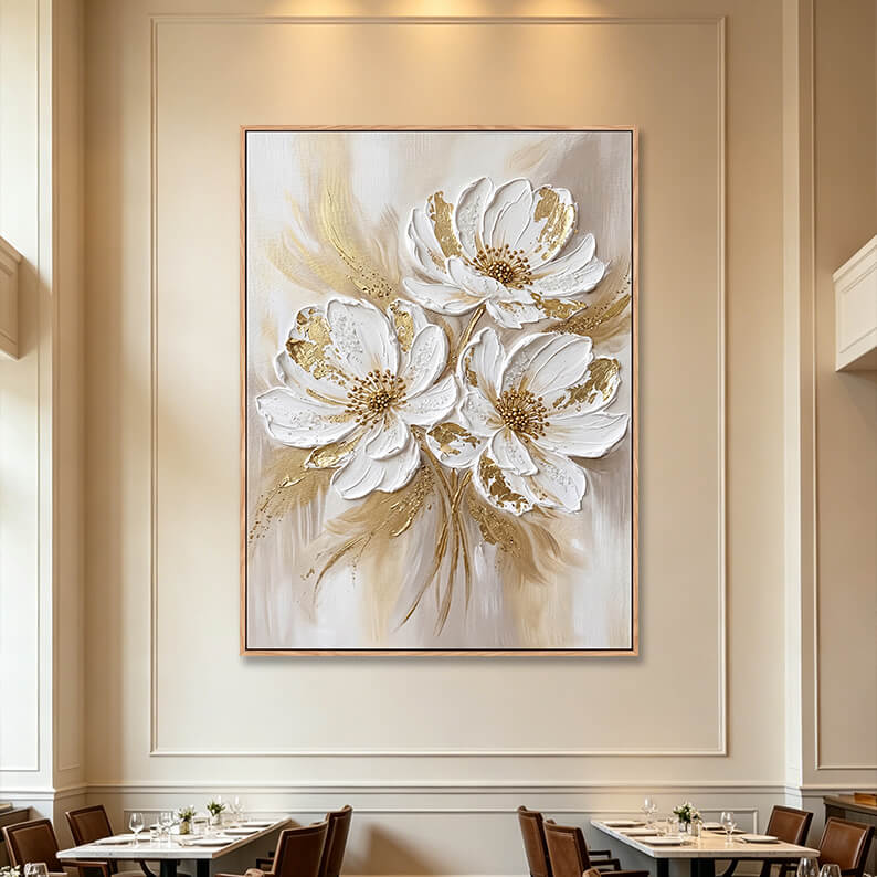 Large vertical 3D textured white flower painting with gold foil in fine dining restaurant, luxury impasto canvas on elegant paneled wall