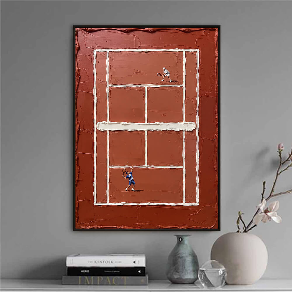 Interior styling view of Clay Court Match sculptural clay court painting art hanging above a table set with books and a vase.