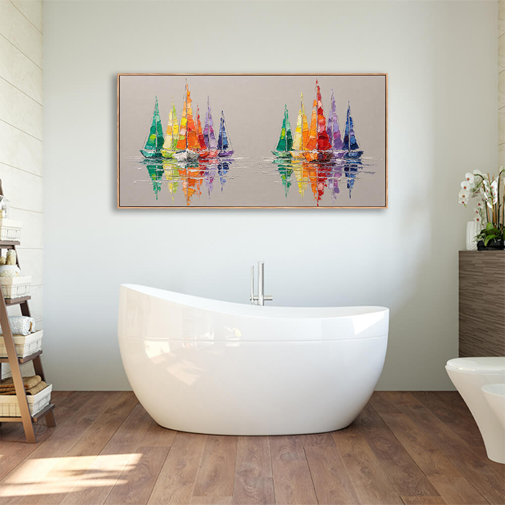 Framed rainbow fleet sailboat seascape wall art mounted above freestanding bathtub