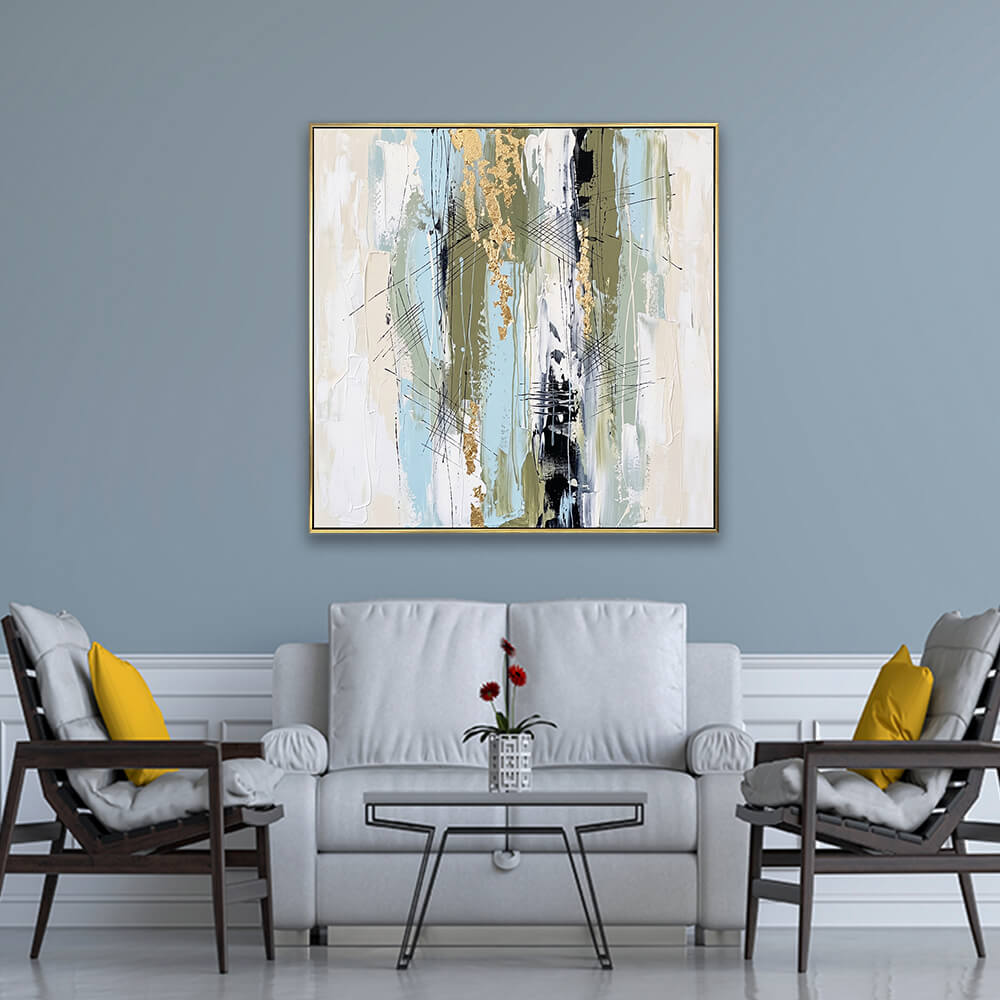 Refined gold foil pastel abstract artwork hanging on light grey formal living room wall