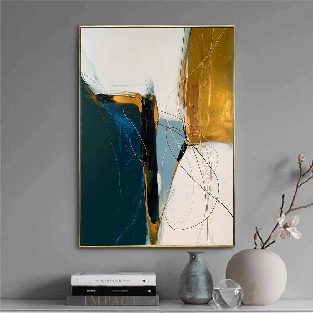 Minimalist grey wall scene, vertical soft texture teal gold abstract canvas displayed above books and ceramic vases