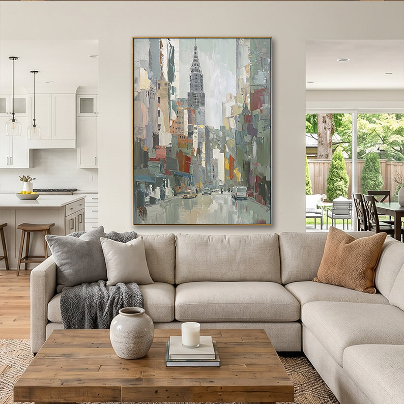 Large textured Manhattan architecture painting featured in a modern open-concept kitchen and living space.