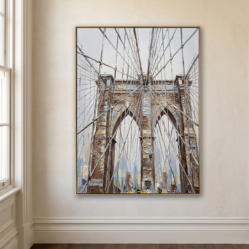 Detailed view of a textured NYC bridge painting on a clean white wall with classic molding.