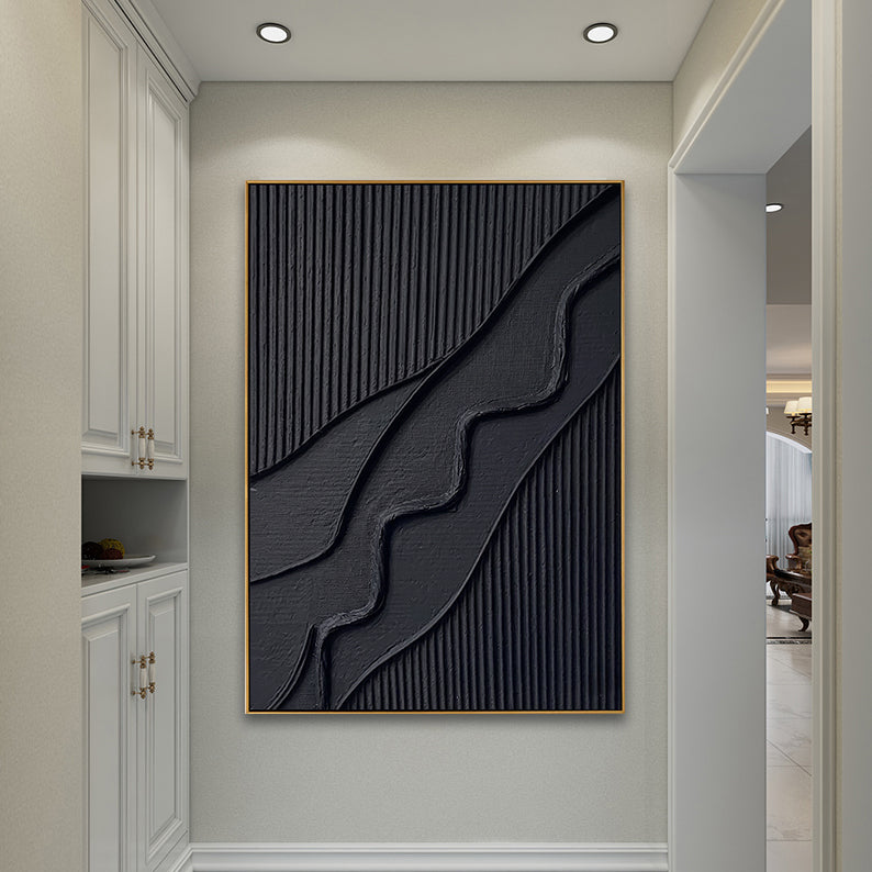 Close-up of textured forest green relief art in a sunlit modern entryway setting.