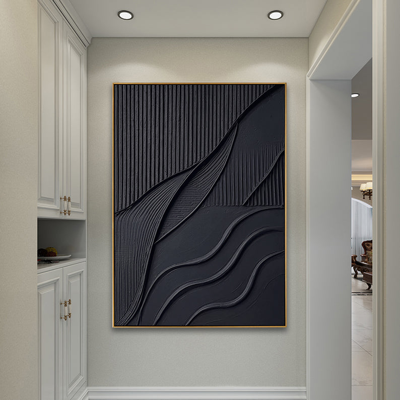 Vertical ridge textured black artwork mounted in a bright white corridor with built-in cabinetry.