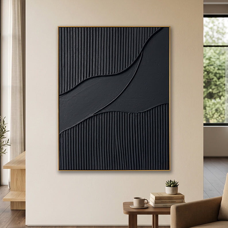 3D monochromatic wall art in a contemporary living room setting with books and coffee on a side table.