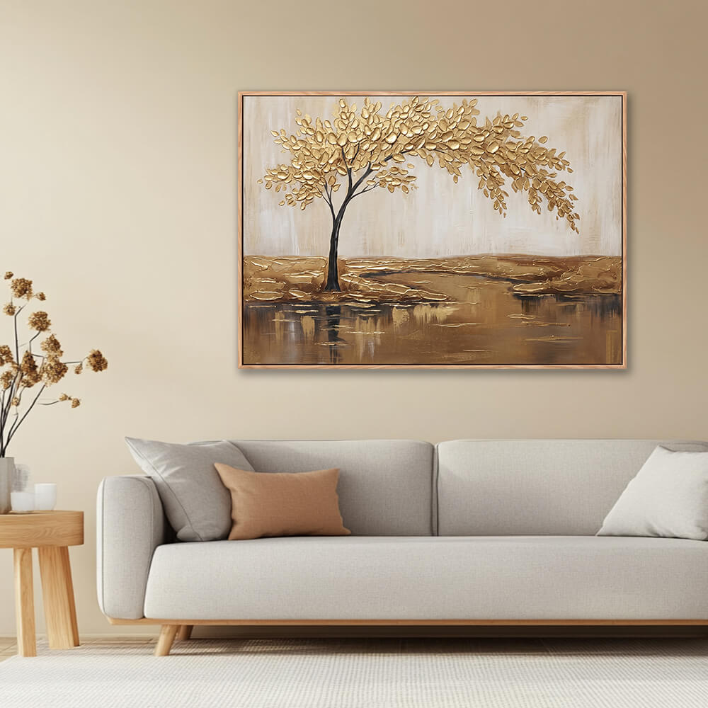 Textured gold tree painting in warm neutral living room with beige sofa