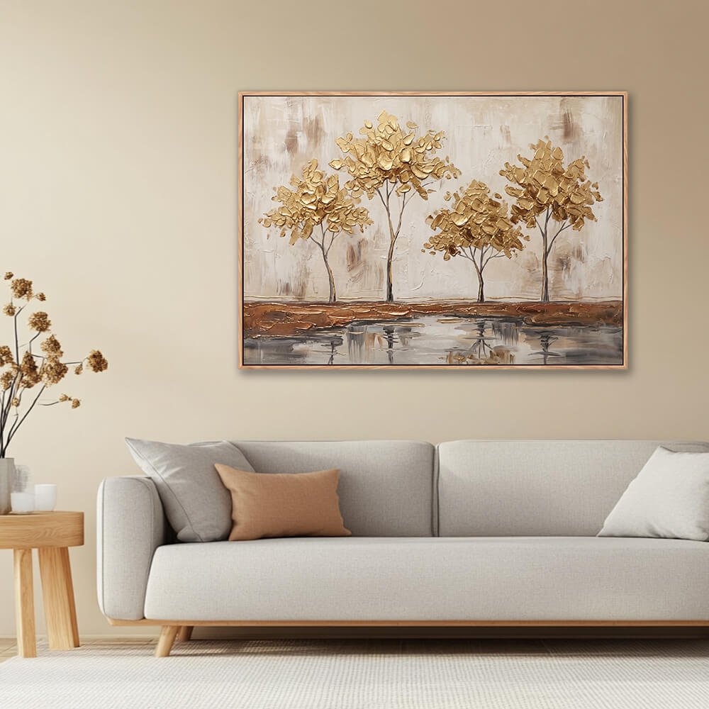 Textured gold trees painting in warm neutral living room with beige sofa