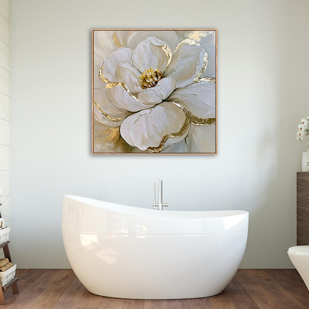 Luxury gold leaf peony floral canvas mounted above freestanding white oval bathtub in warm wood spa bathroom